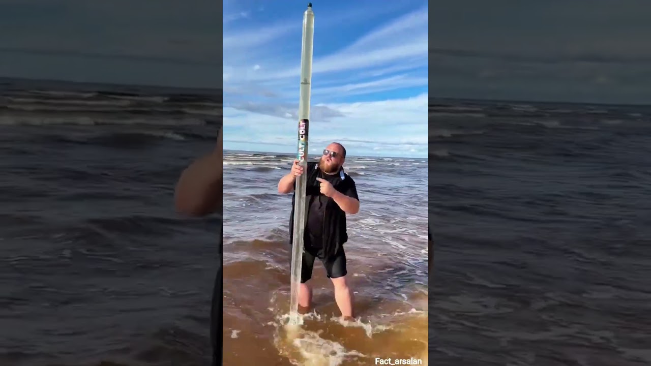 A man puts dirty water into a big pipe and 2 can pure water 