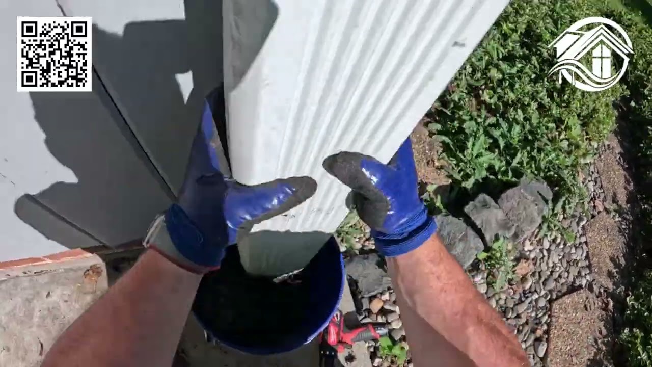 Unclogging Down Spout - ClearFlow Gutter Cleaning