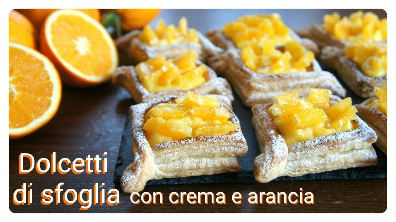 Dolcetti di sfoglia con crema e arancia