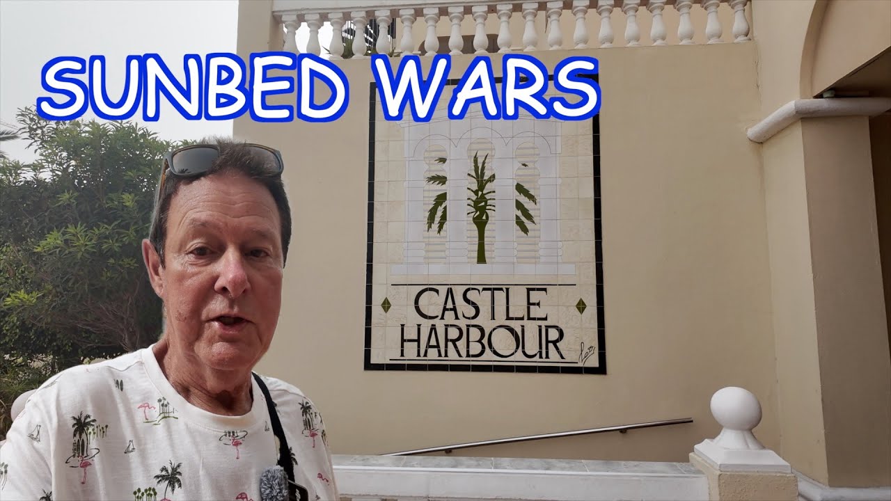 Tenerife -Take A Look Around Castle Harbour Find A Place For Your Sun bed Before The Pool Opens.