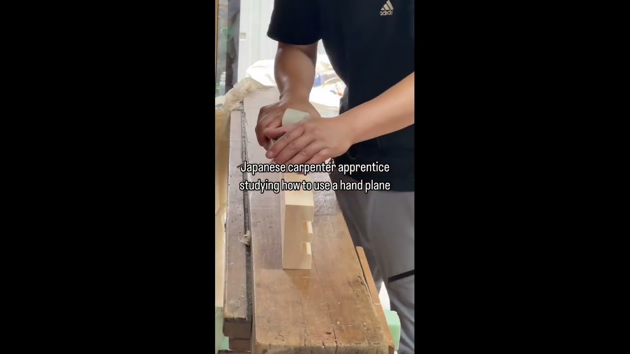 【Japanese carpenter  at work】Japanese carpenter apprenticestudying how to use a hand plane