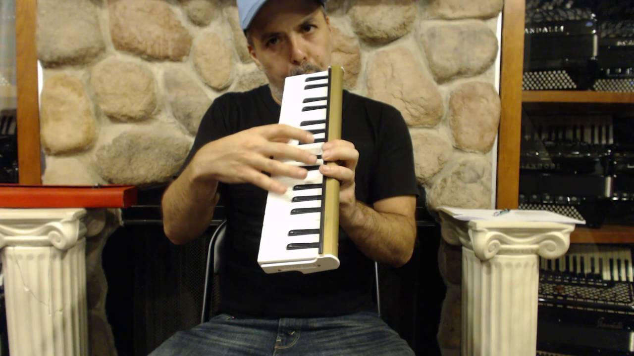 2334 - Golden Chrome Italian Clavietta Melodica M 34 $499