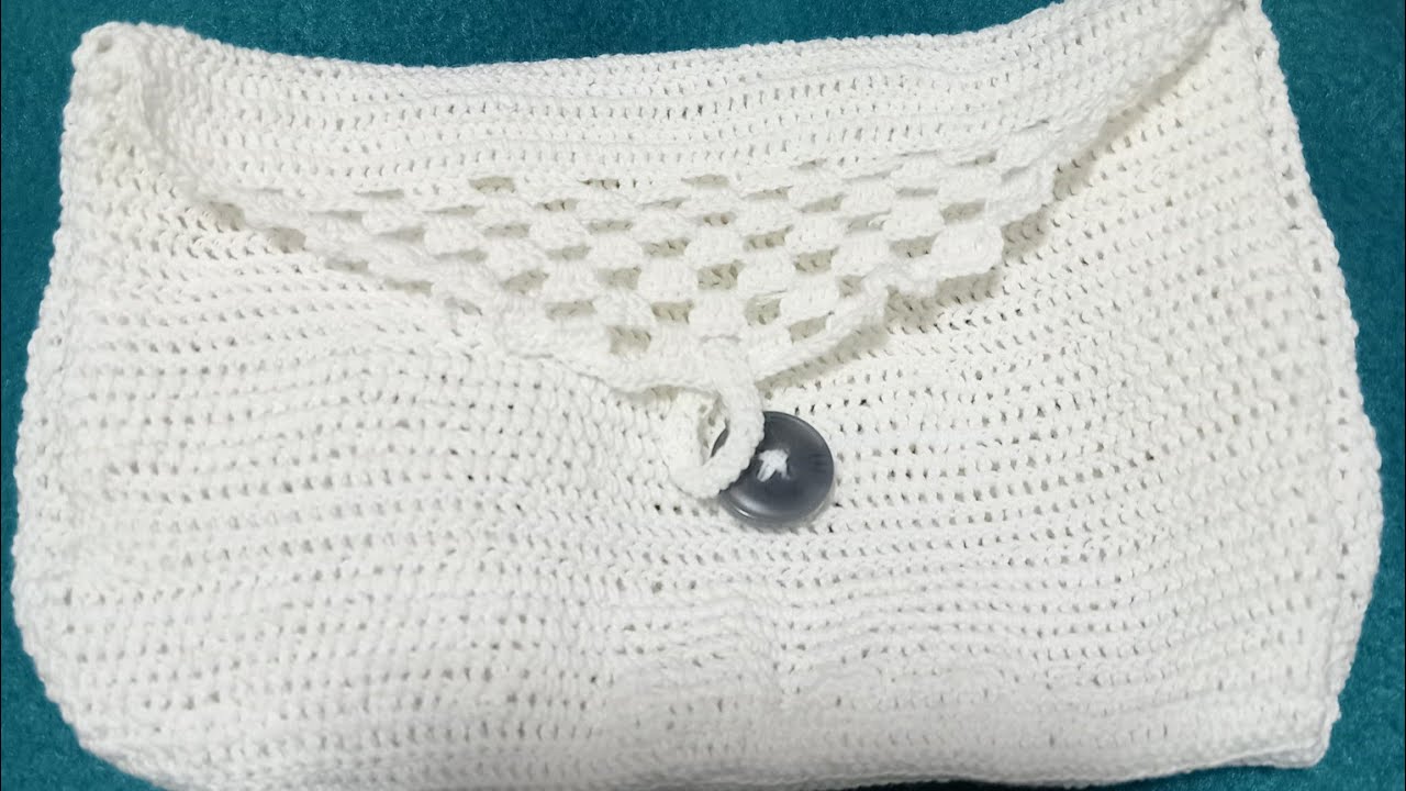 Crocheting a pouch is almost done 