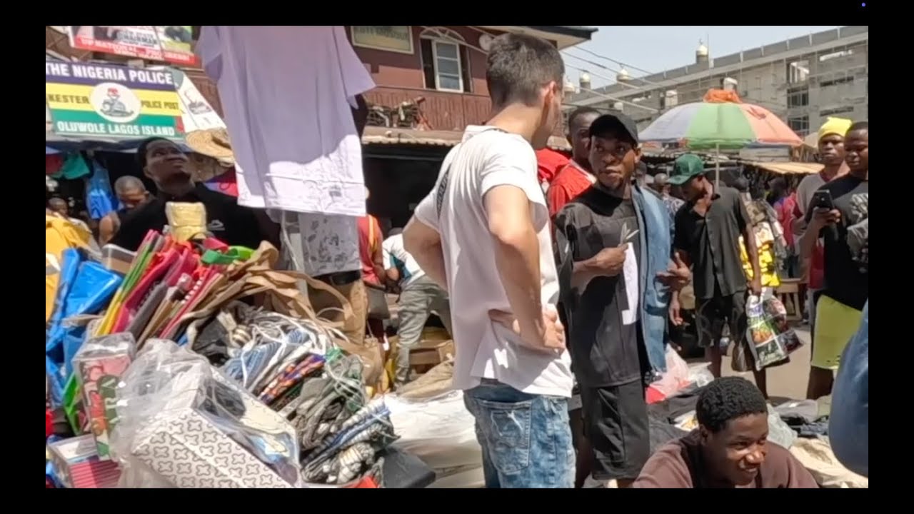 First white guy that scammed Nigerians Lagos Nigeria chaotic street market part 3