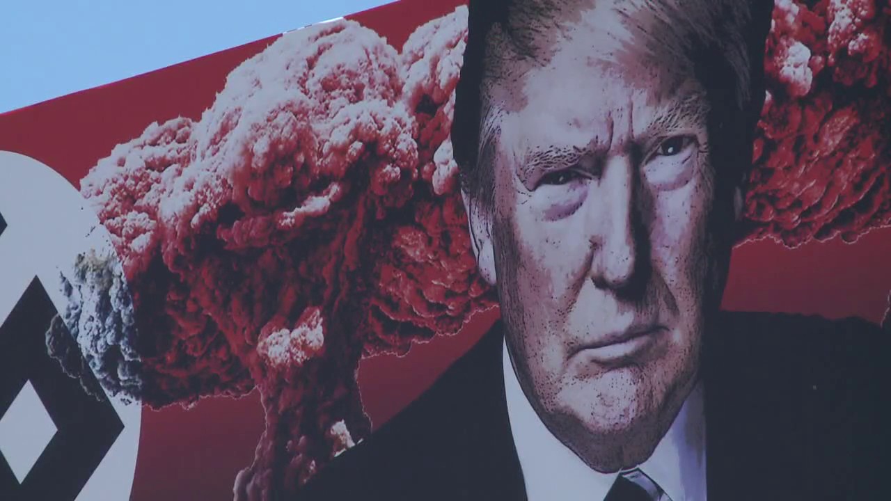 Artist of anti-Trump billboard in Phoenix gets death threats
