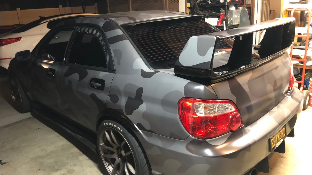 Vinyl wrapping and install of my STI wing!