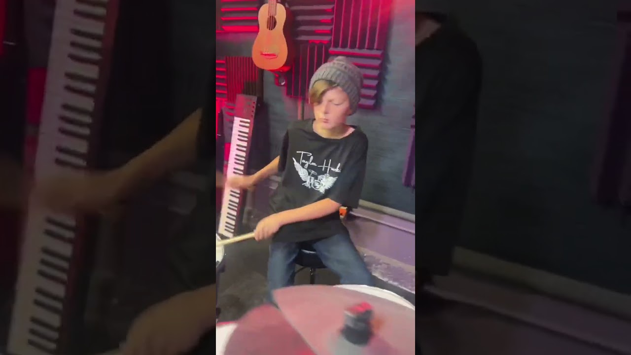 Raized Wrong performs Wipeout by the Surfaris
