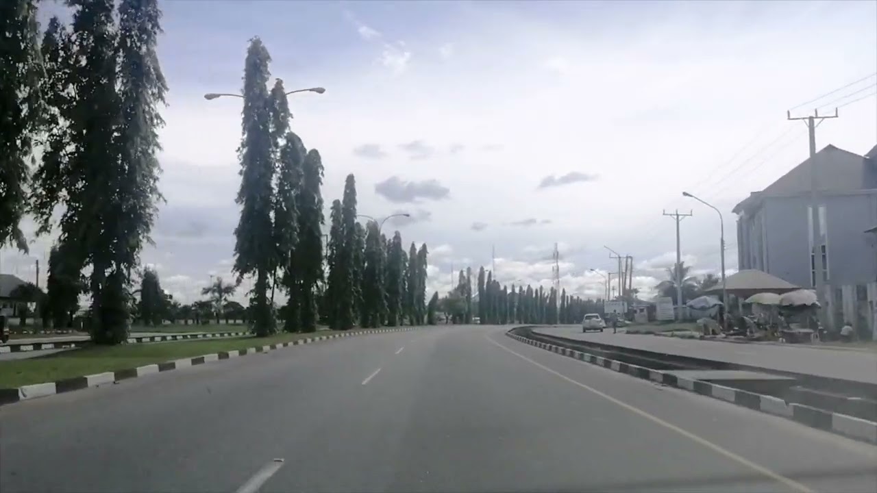 Driving along Four Lanes Edet Akpan Avenue in Uyo, Akwa State. Nigeria.