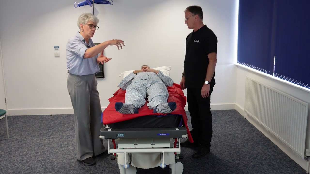 Turn a Person on their Side on a Trolley Using a Slide Sheet