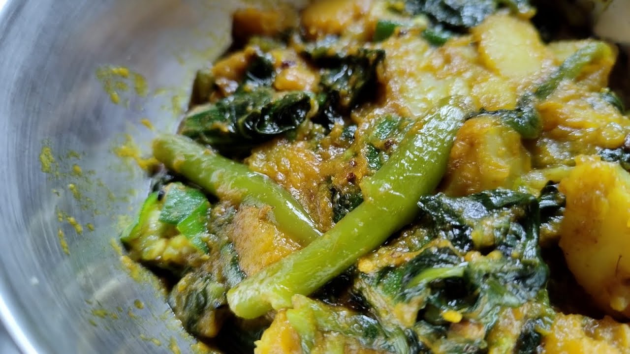 This dish is very familiar in every Bengali household/Pui Shake Niramish Curry