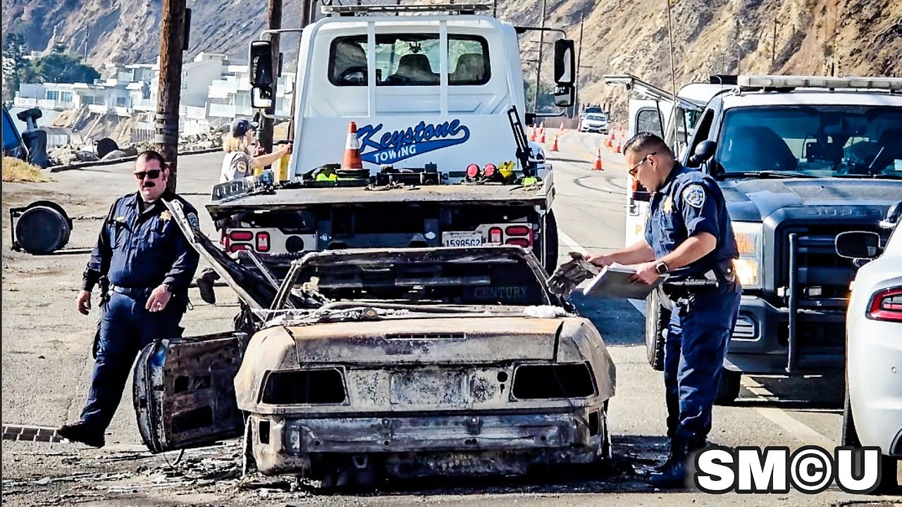 California Highway Patrol Officers Tow Burnt Vehicles Along PCH in Malibu After Devastating Blaze