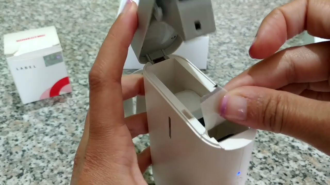Stampante per etichette in collaborazione con l'azienda NIIMBOT-Utile per personalizzare i pacchetti