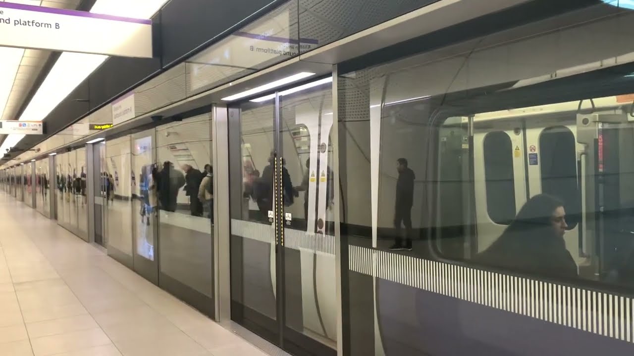 Elizabeth Line (Crossrail) Class 345 (Purple Train) Departs Whitechapel for Abbey Wood.