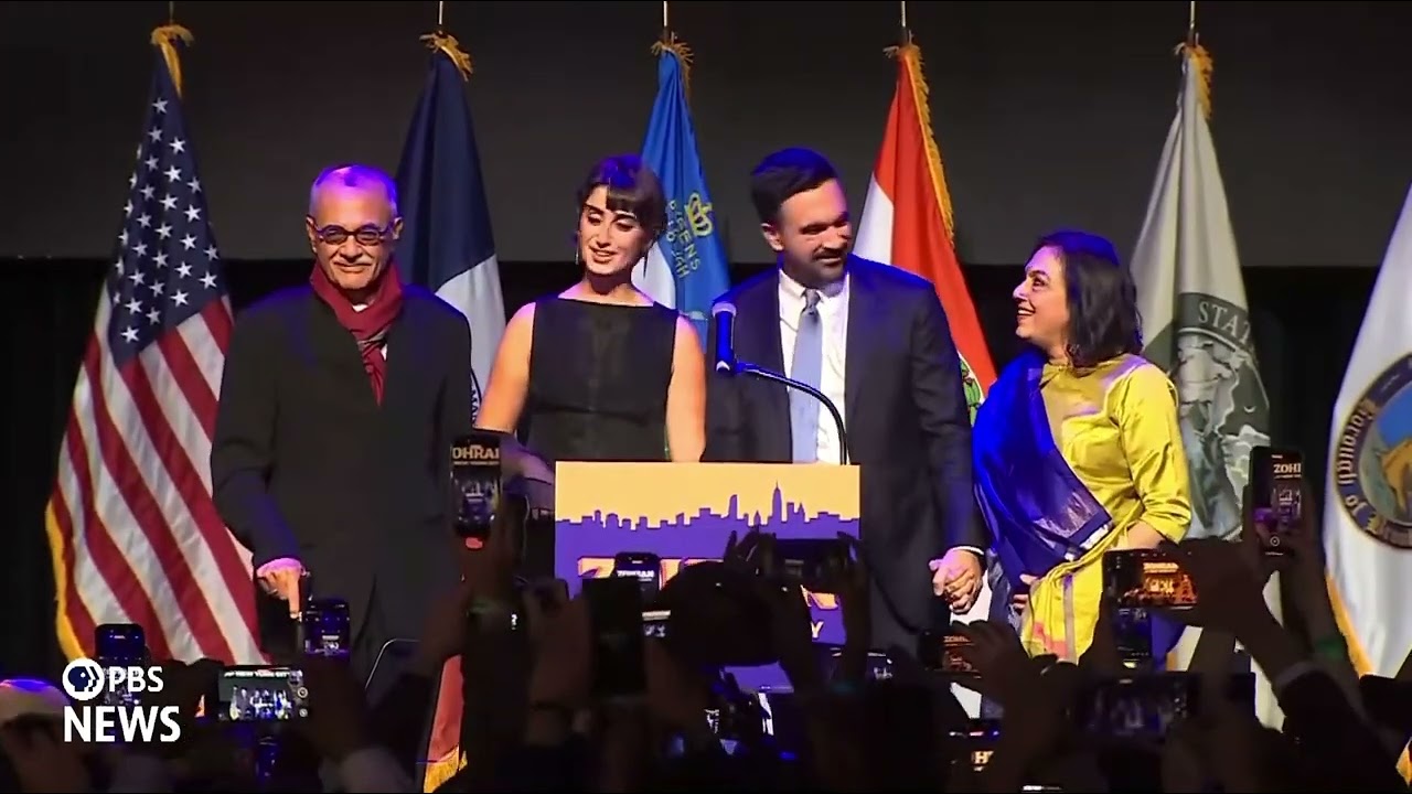Zohran wife and mom walk on stage to Dhoom Machale (song) by Sunidhi Chauhan