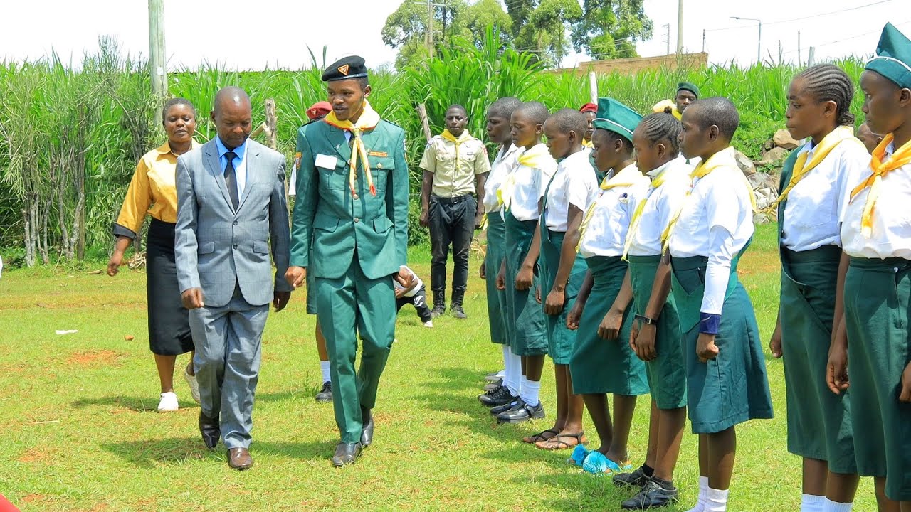See how Pastor Matara matching and inspected pathfinders parade