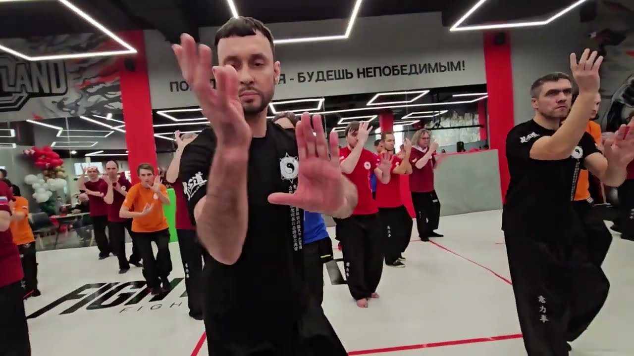 17 people breaking the boards. 30 people doing the 21 iliqchuan form. Demo of russian ILC schools.