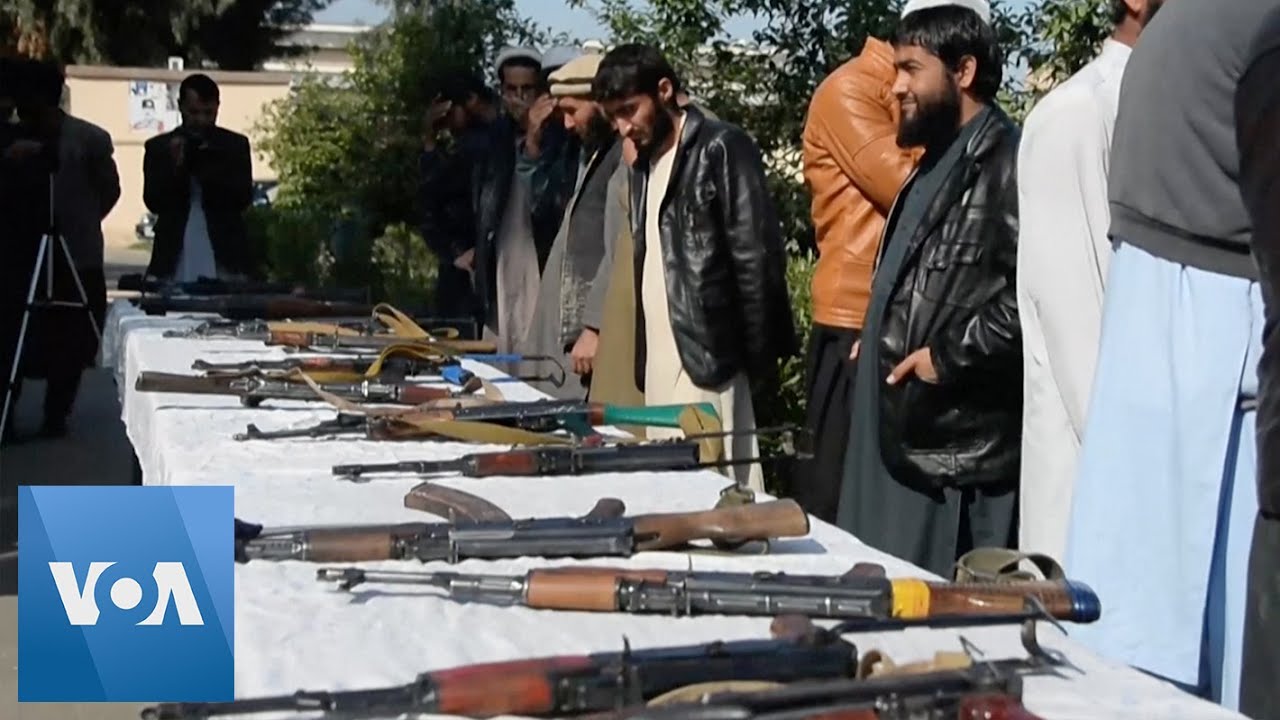 Taliban Fighters Give Up Weapons Amid Peace Process