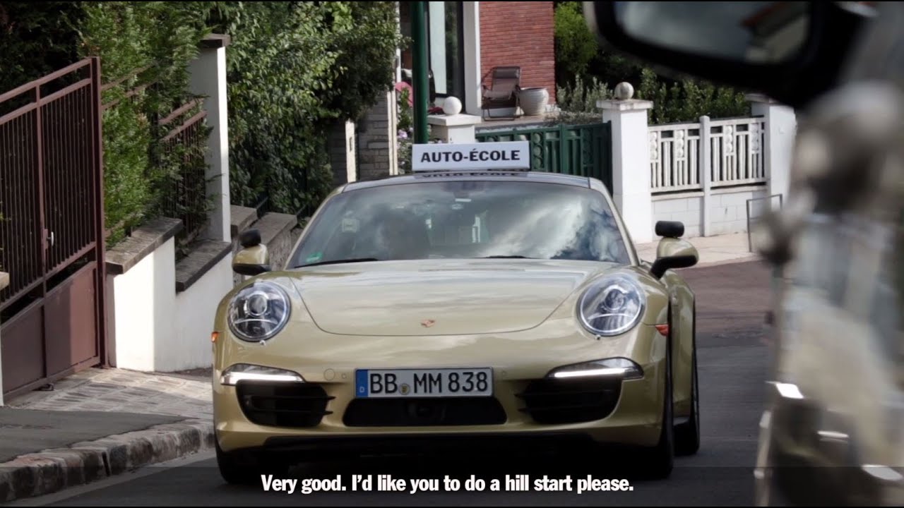 Taking the driving test in a sports car.