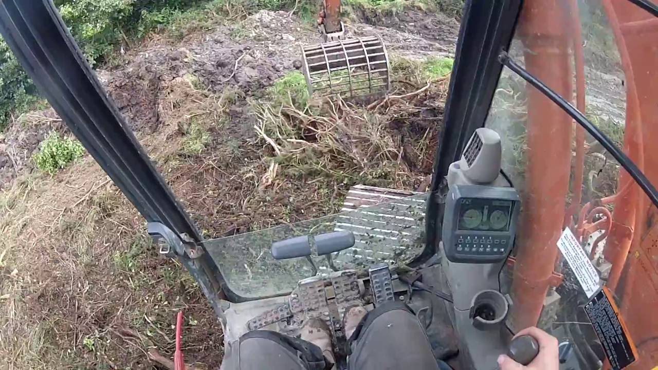 Loading bushes with Hitachi 130-3 LCN Excavator