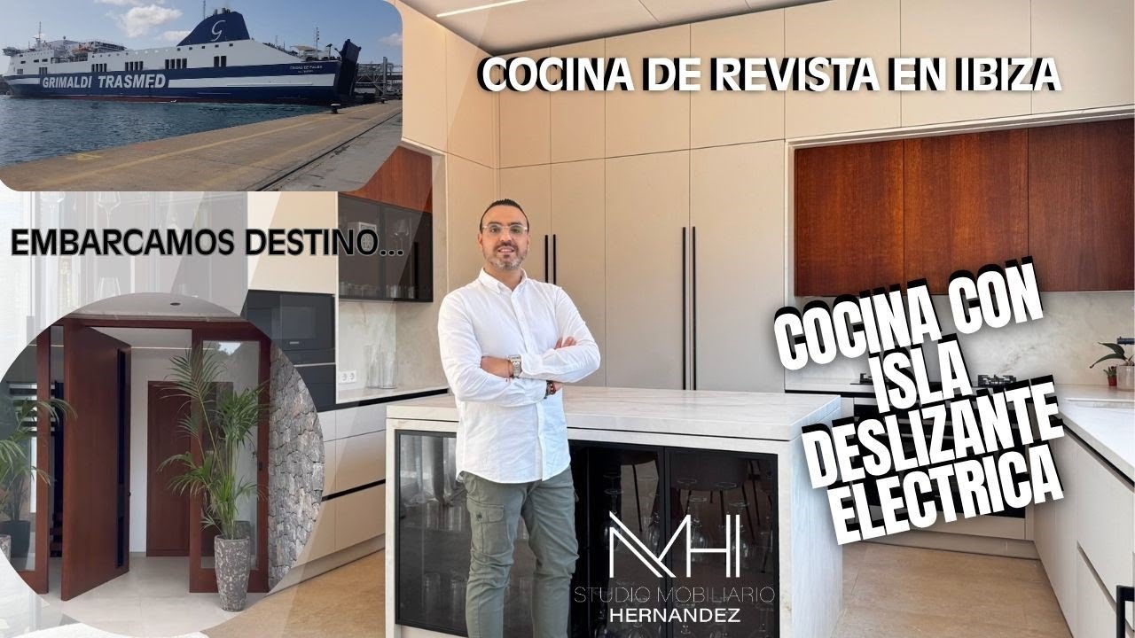 Cocina moderna y elegante abierta al salón con isla y desayunador - Studio Mobiliario Hernández
