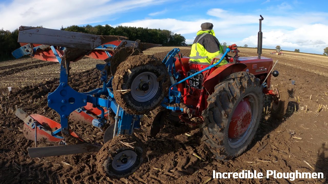 1956 International Harvester B275 2.3 Litre 4-Cyl Diesel Tractor (38 HP) with Ransomes Plough