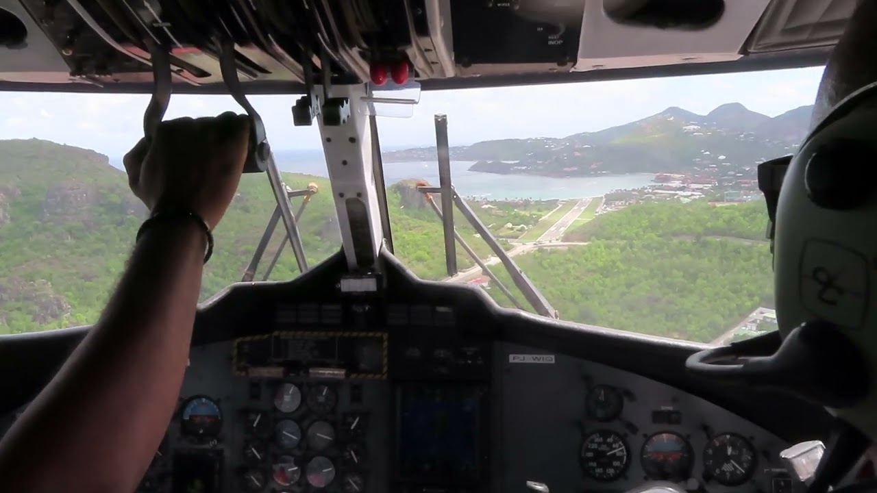 the amazing landing at St Bart's in a  WinAir DHC 6 Twin Otter PJ-WIQ 7th October 2022