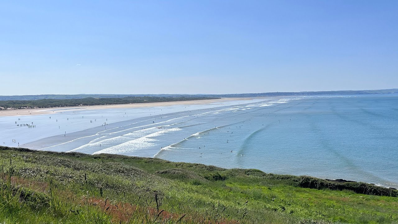 Surfing at Saunton Sands Devon - 4k drone footage