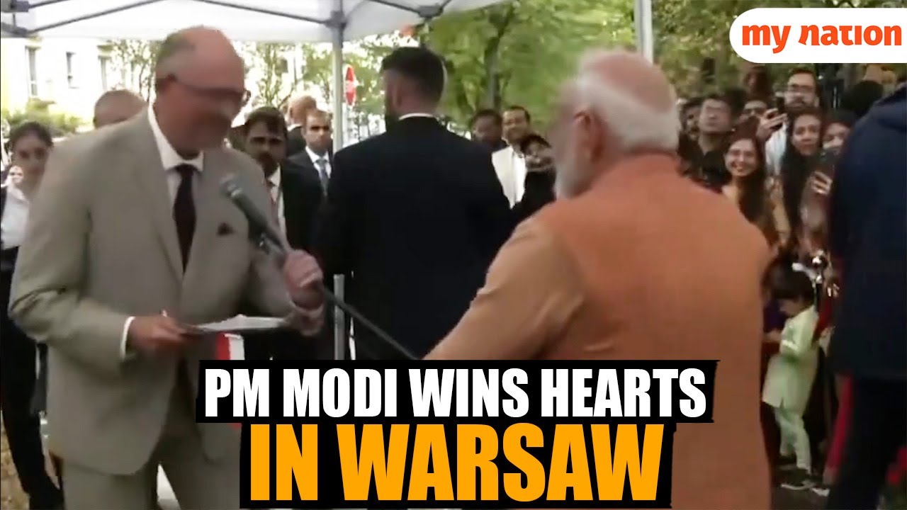 PM Modi&rsquo;s Mic Adjustment Gesture in Poland Wins Hearts | Warsaw