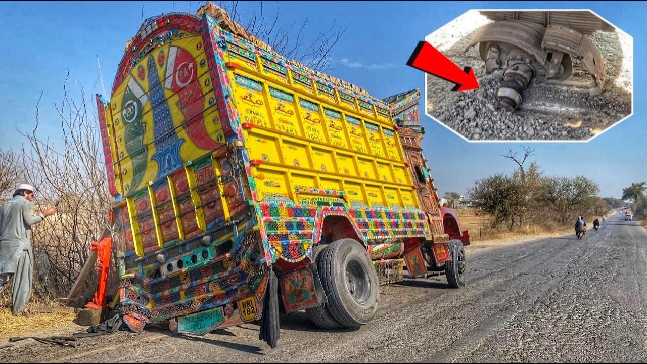 Truck tube stuck on the road Emergency Repair After Heavy Load Disaster