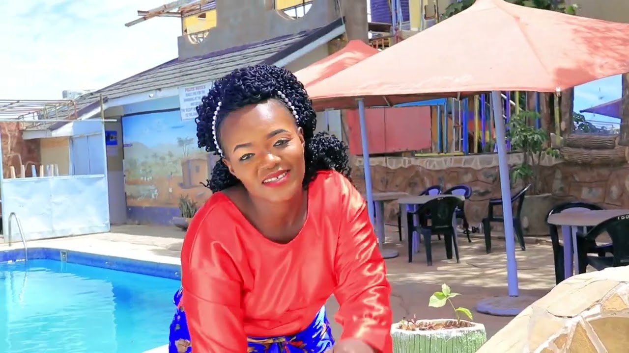 EKA TATA NGUKATHIIE BY ANN MBINYA { OFFICIAL VIDEO } VIDEO  BY REAL FOCUS MEDIA -0796062936