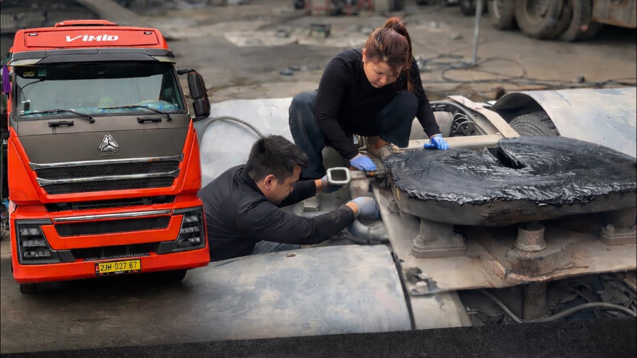 A car repair session with my wife: replacing the spring support bracket on a 460hp Sitrack.