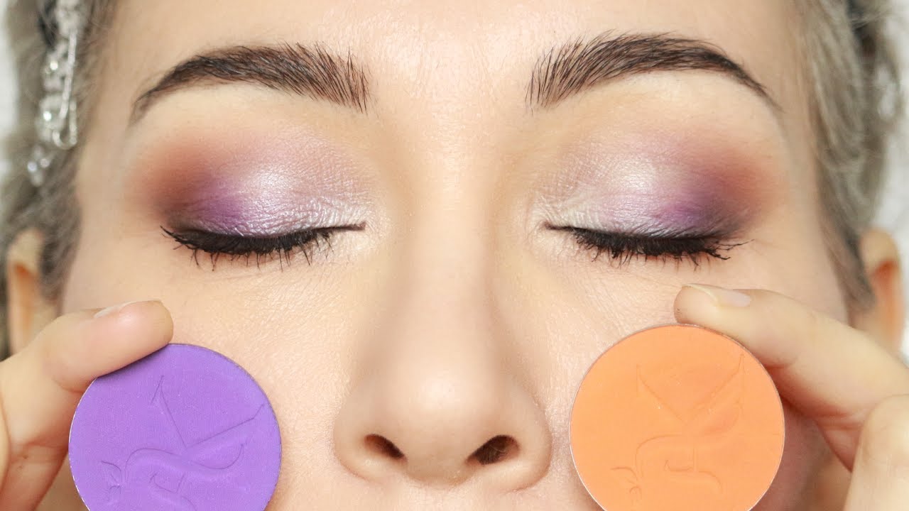 Trucco occhi gonfi con viola e arancio. Trucco colorato e portabile