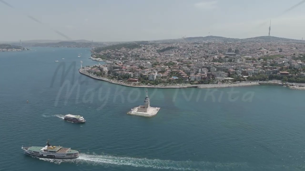 D-Log M. Istanbul, Turkey. Maiden Tower Kiz Kulesi on Bosphorus islet with water taxis and ferrie...