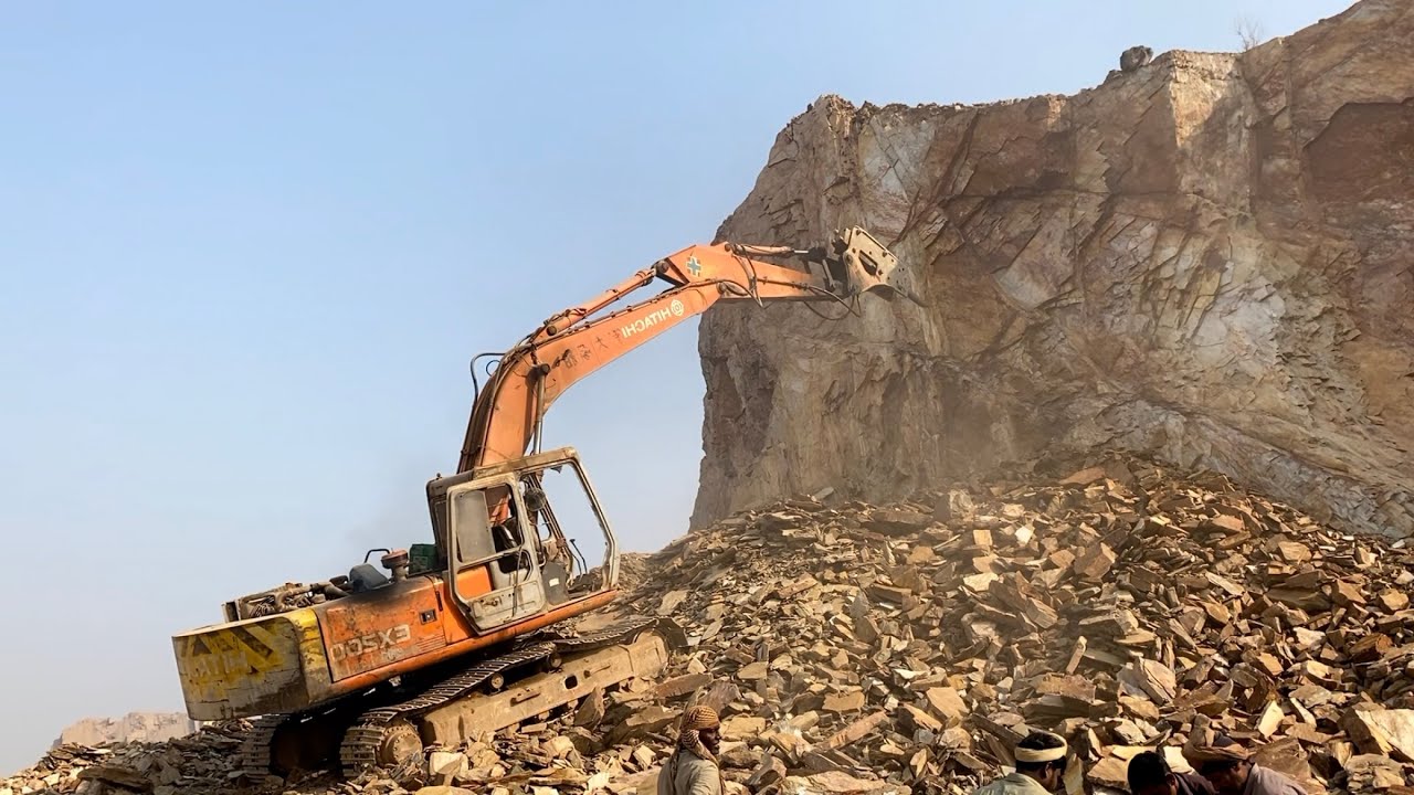 Amazing excavator performance | Breaking huge rocks with powerful machinery 💯