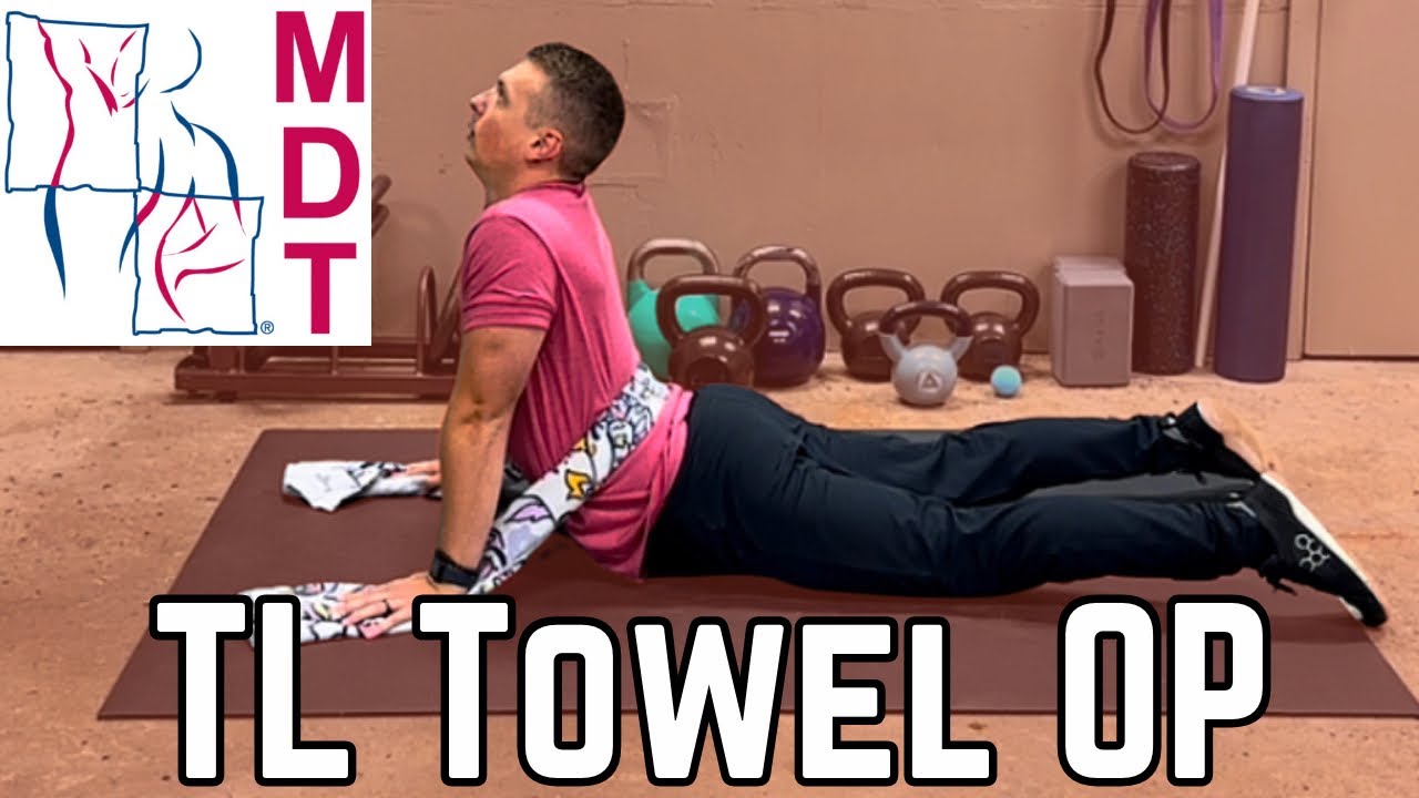 Thoracolumbar Extension in Lying (Towel OP) — Mechanical Diagnosis and Therapy (McKenzie Method)