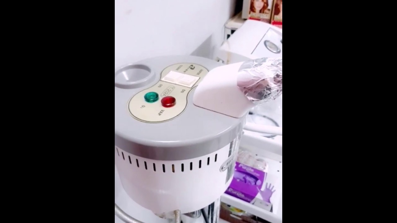 تعليم الحلاقة والتجميل :آلة البخار (VAPOZONE)لتنظيف البشرة