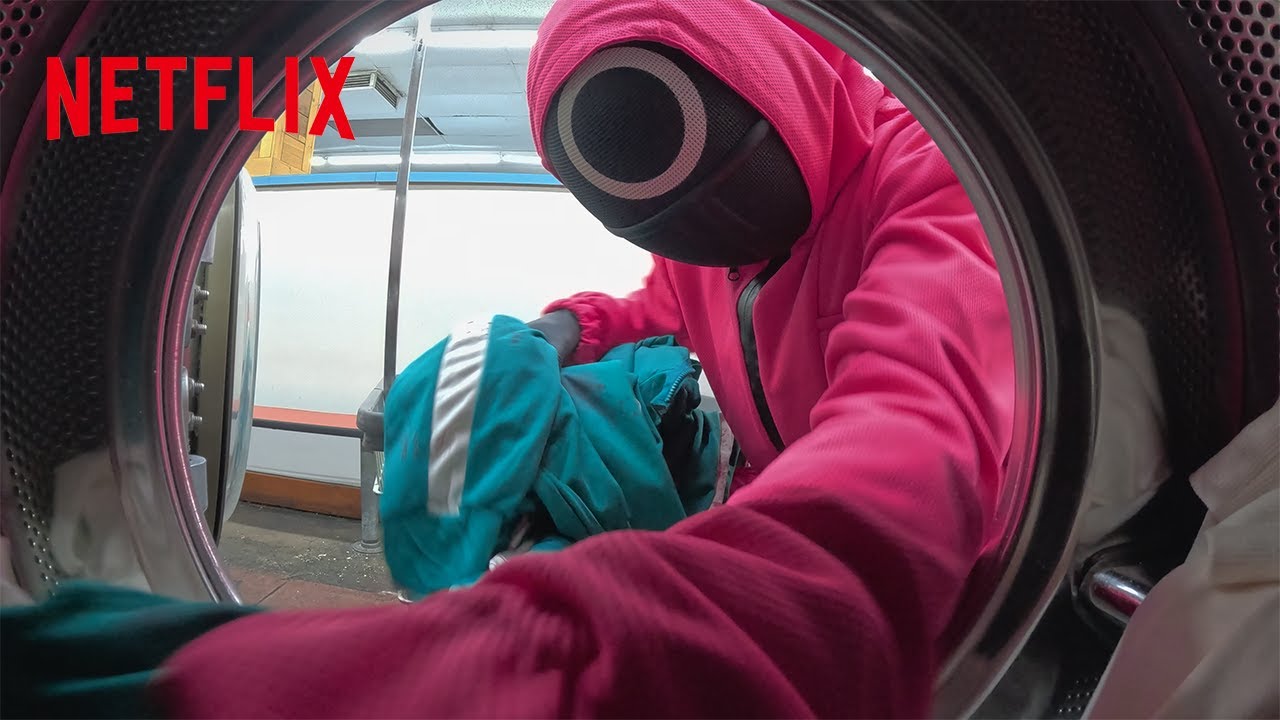 Squid Game Pink Guards Spotted At A Local Laundromat | Netflix