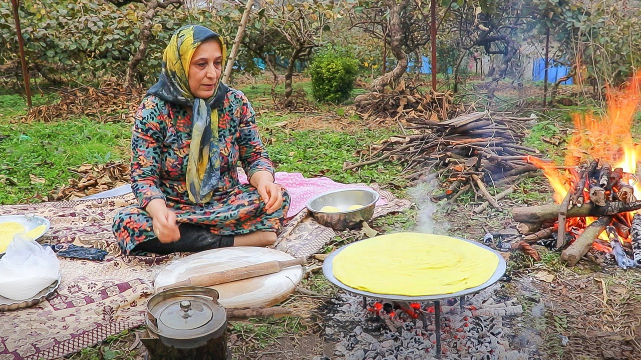 Cooking IRAN bread in nature on the saj - Village vlog (پخت نان روی ساج)