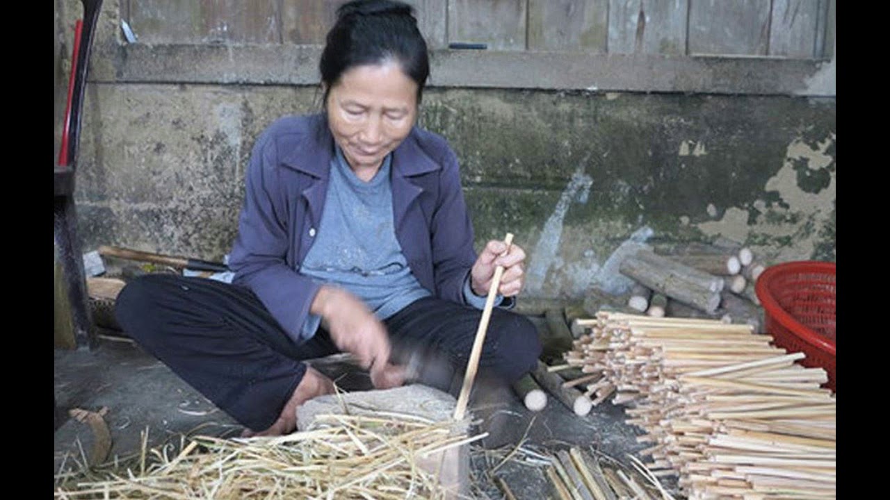 VIETNAM:  moments in time no. 253  -  MAKING CHOPSTICKS