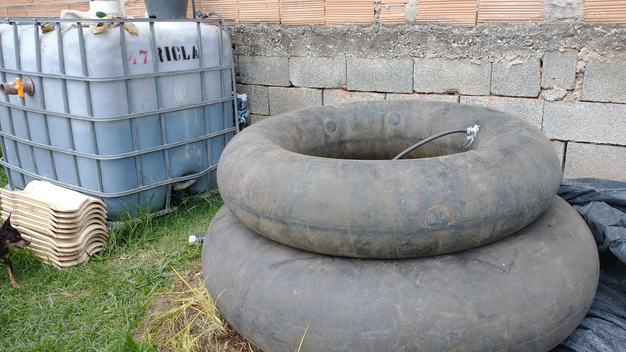 Biodigestor caseiro de 1000 litros. Explicando como é feito adaptação da mangueira na câmera de ar.