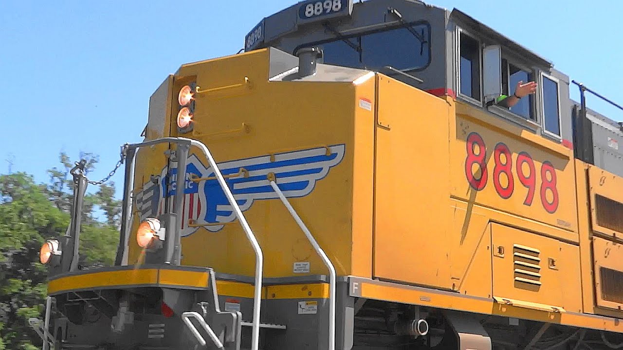 Union Pacific EMD SD70AH Leading Norfolk Southern