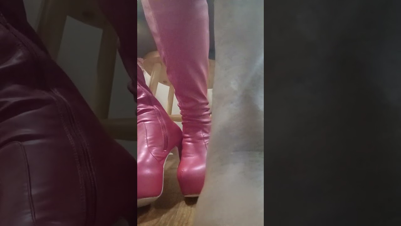 Miss Heather tapping heels and toes in her red high heel boots
