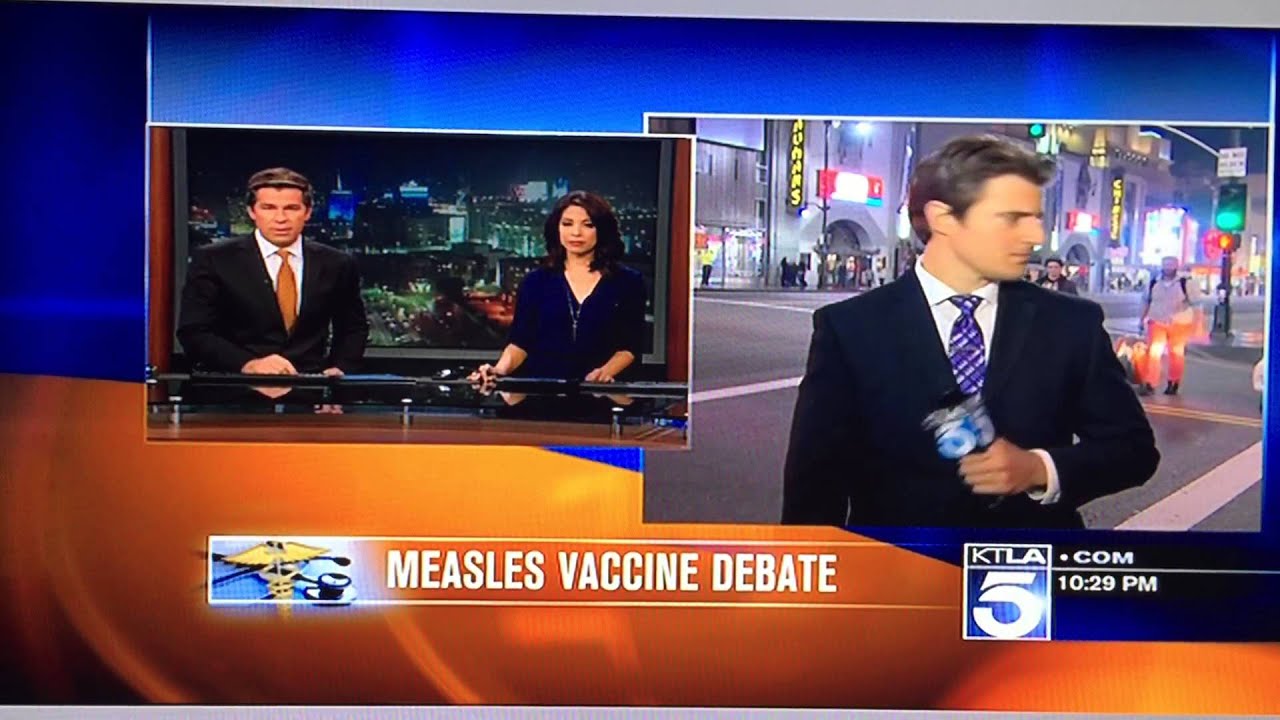 KTLA Reporter, Steve Kuzj, Pushes A Bum Out Of The Way On TV