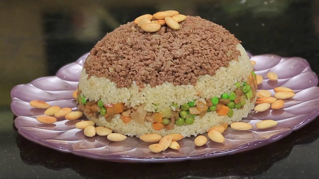 !!جددي في أكلك وجربي الرز بالبسلة واللحمة المفرومة