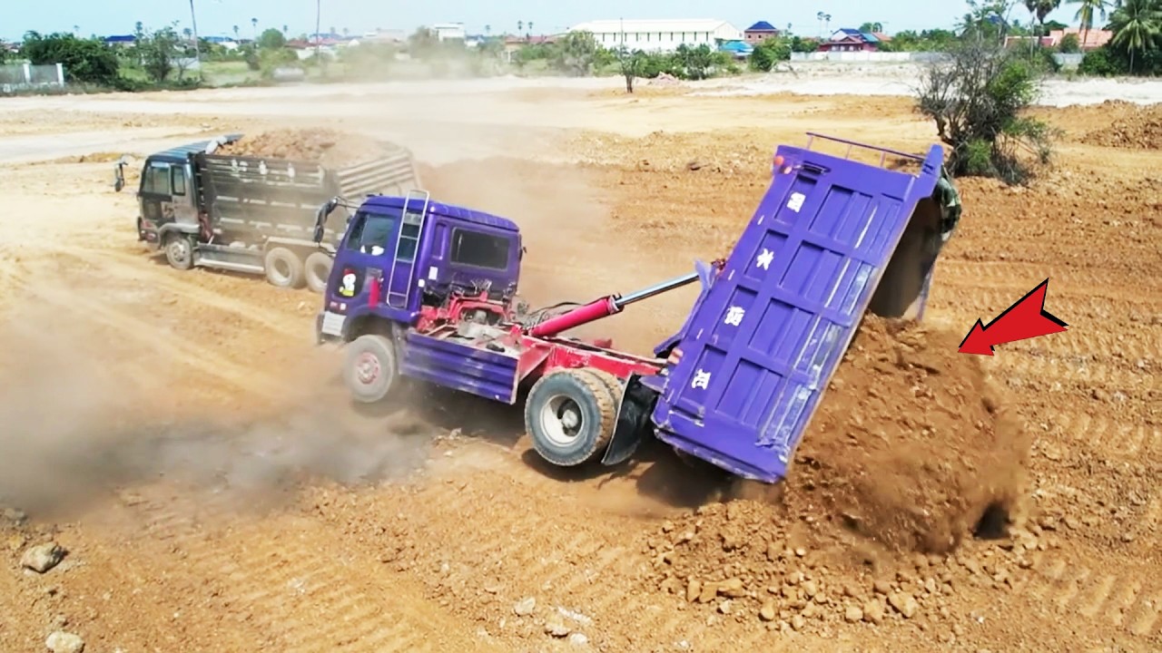 INCREDIBLE!! Unexpected Dump truck Unloading gone wrong Land Filling Up Deep Pond  Operator Must Be