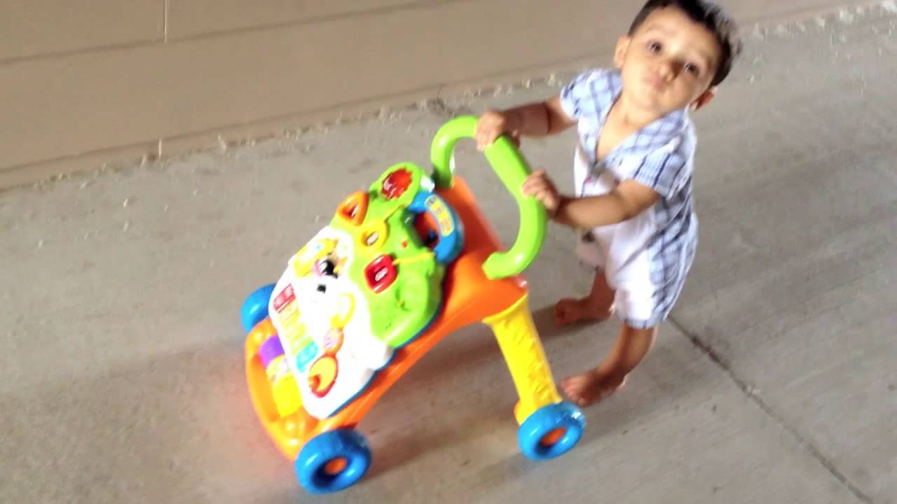11 month old baby walking with Vtech walker
