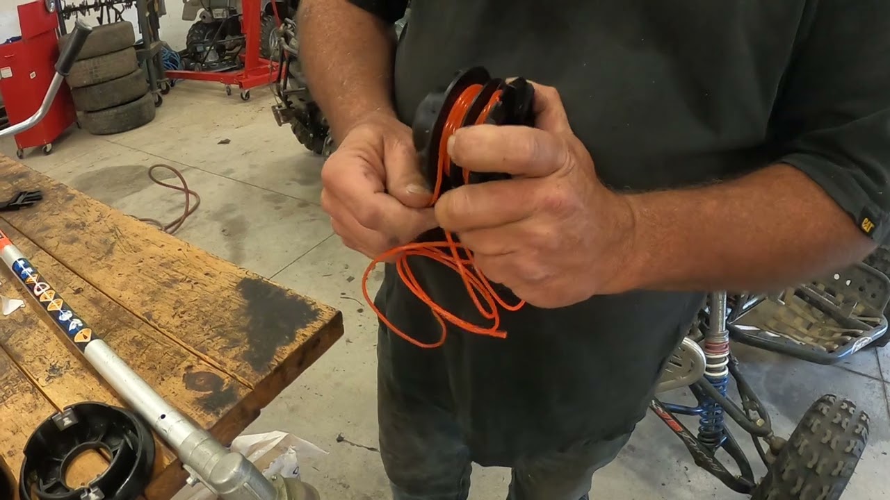 Putting string on Proyama weed eater and brush cutter