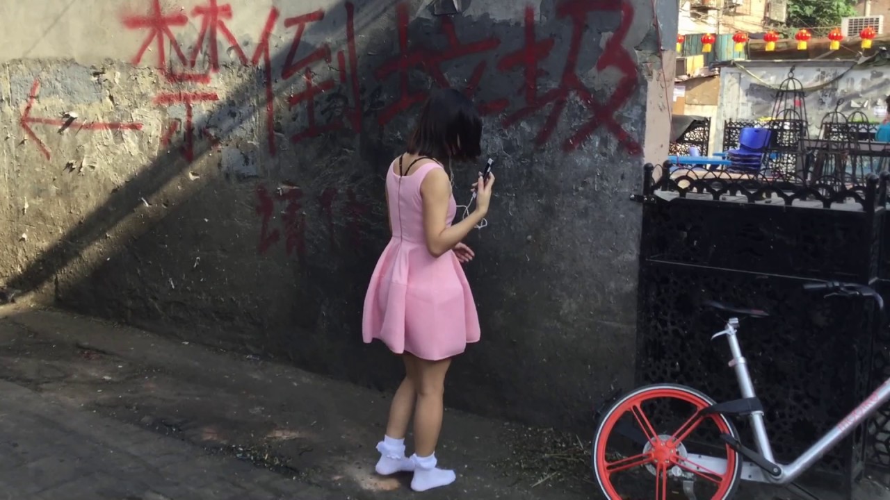 Vivi walking in white dirty socks  on the street PREVIEW