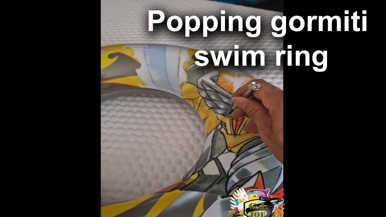 Pop inflatable - Popping a yellow gormiti comic swim ring