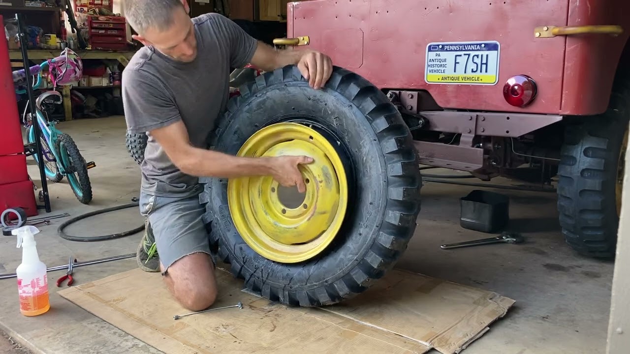 Mounting a tube type tire by hand